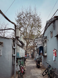 Street amidst buildings against sky