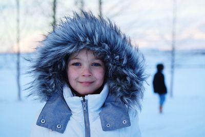 Portrait of girl wearing jacket during winter