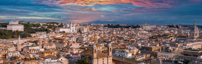 High angle view of cityscape against sky during sunset