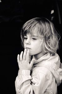 Portrait of cute girl looking away