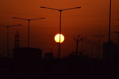 Street light against sky at night