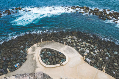 High angle view of rocky beach