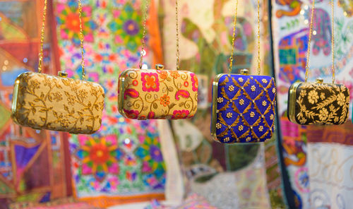 Close-up of multi colored objects for sale in market