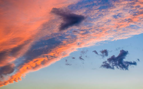 Low angle view of dramatic sky during sunset