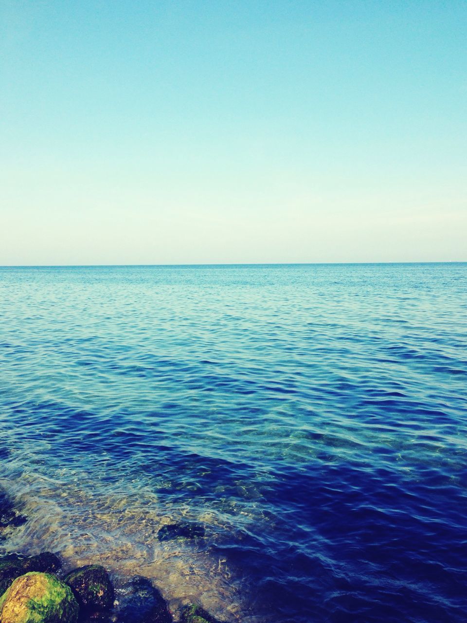 horizon over water, sea, water, scenics, blue, copy space, tranquil scene, clear sky, tranquility, beach, seascape, beauty in nature, nature, shore, summer, remote, outdoors, calm, tourism, vacations, wave, day, non-urban scene, coastline, no people, majestic, solitude, ocean