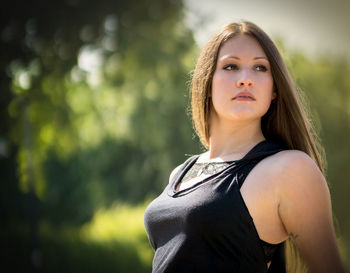 Portrait of beautiful woman standing outdoors