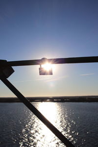 Scenic view of sea against clear sky during sunset