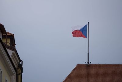 Low angle view of flag against clear sky