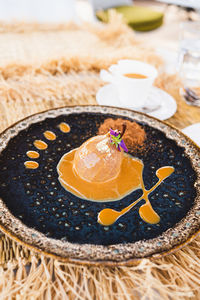 Warm backed pear desert with caramel sauce