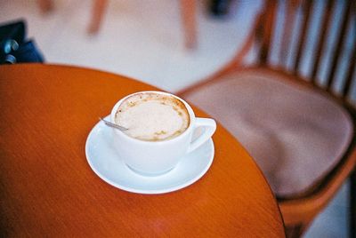 Close-up of coffee cup on table