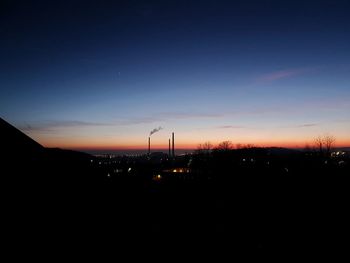 Scenic view of silhouette land against sky during sunset