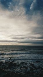 Scenic view of sea against sky at sunset