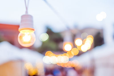Close-up of illuminated light bulb