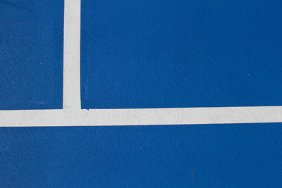 Blue training tennis court with white line , top view