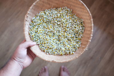 High angle view of hand holding bread