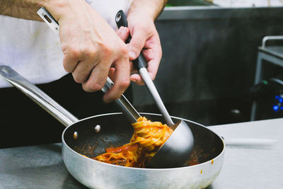 Close-up of person preparing food