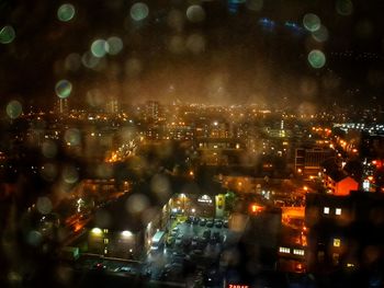 Illuminated cityscape at night