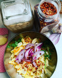 High angle view of chopped vegetables in bowl on table