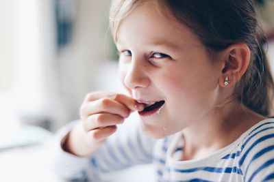 Close-up portrait of smiling girl