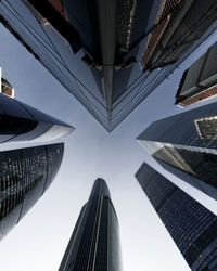 Low angle view of modern buildings against sky