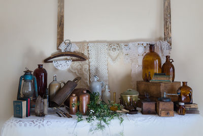 Close-up of old bottles on table