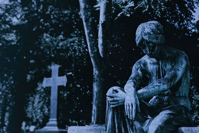 Statue of angel at cemetery