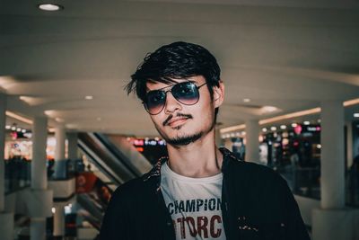 Portrait of young man wearing eyeglasses