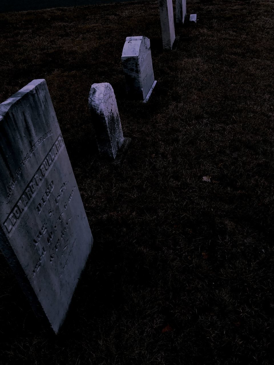 HIGH ANGLE VIEW OF TEXT AT CEMETERY