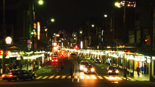 Traffic on city street at night