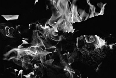 View of woman in dark room