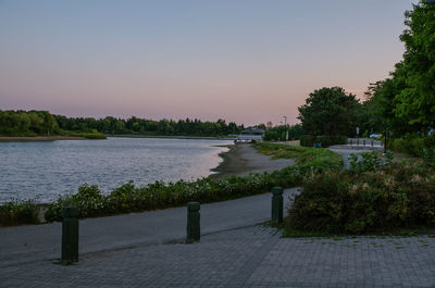 Scenic view of calm lake against clear sky