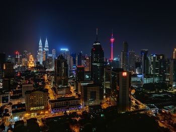 High angle view of illuminated city at night