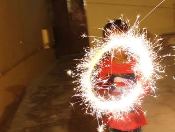 Close-up of illuminated firework display at night