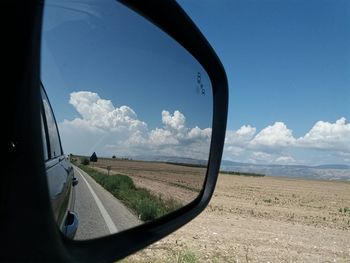 Road seen through car window