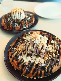 Cake in plates on table