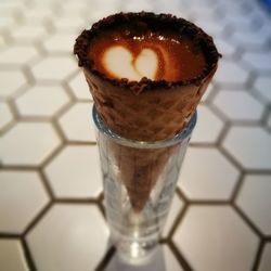 High angle view of ice cream in glass on table