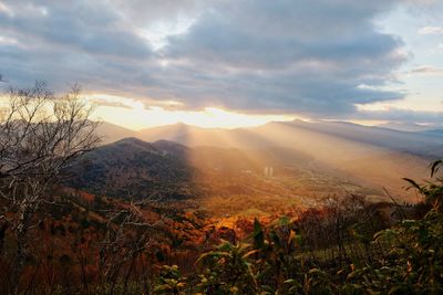 Scenic view of landscape against sky during sunset