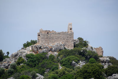 Low angle view of historic building against sky