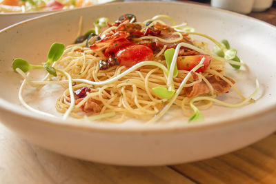 Close-up of noodles in bowl on table