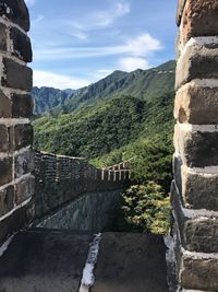 View of stone wall with mountain in background