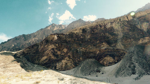 Scenic view of rocky mountains against sky