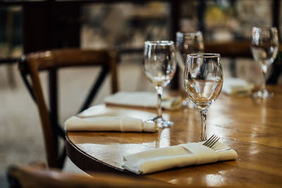 Luxury table settings for fine dining with and glassware, beautiful blurred background. 