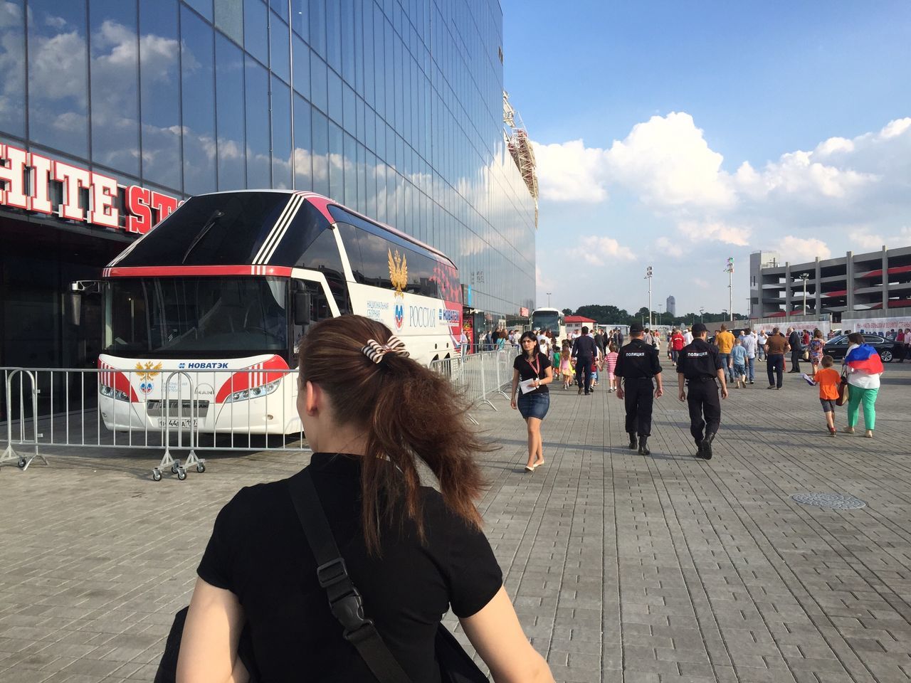 architecture, building exterior, built structure, lifestyles, sky, person, leisure activity, city, men, cloud - sky, large group of people, city life, modern, cloud, street, standing, day, walking, office building