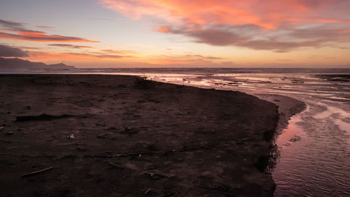 Purple sunset shot, kapiti coast beach, paraparaumu , wellington area, north island of new zealand.