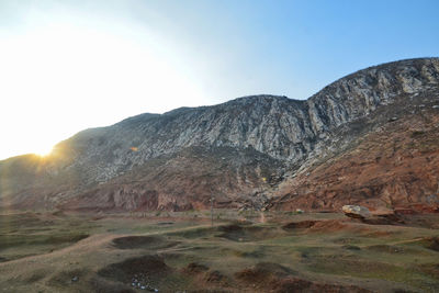 Scenic view of volcanic mountain against clear sky