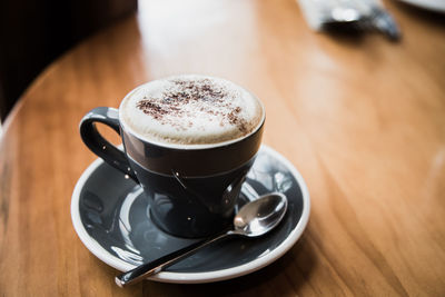 High angle view of coffee on table