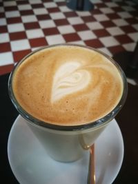High angle view of cappuccino on table