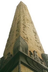 Low angle view of skyscraper against clear sky