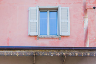 Low angle view of window of building