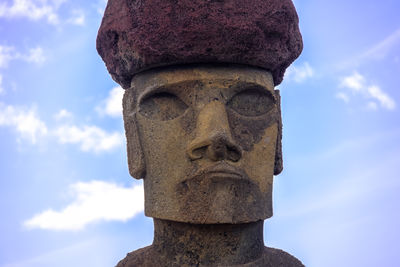 Low angle view of statue against sky